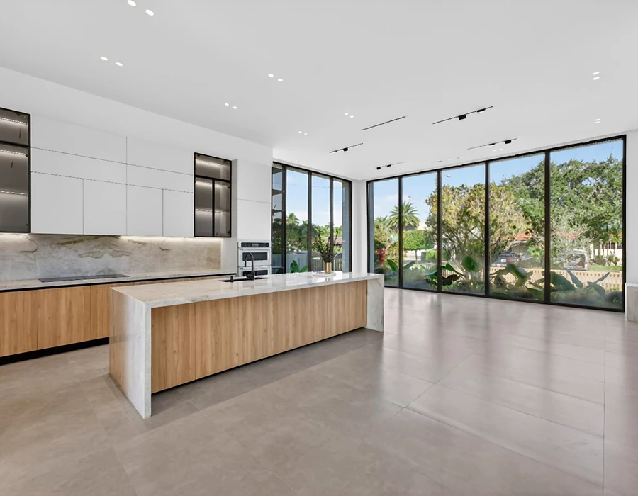 Kitchen cabinetry and wood-finish island supplied for the Miami builder project