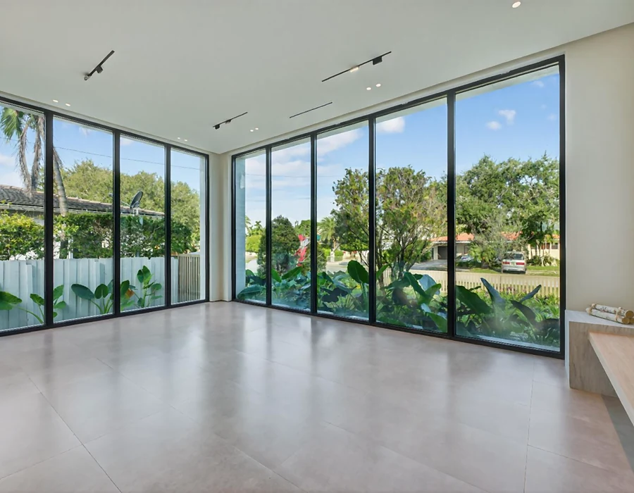 Black-framed glazing and sliding doors in the Miami project