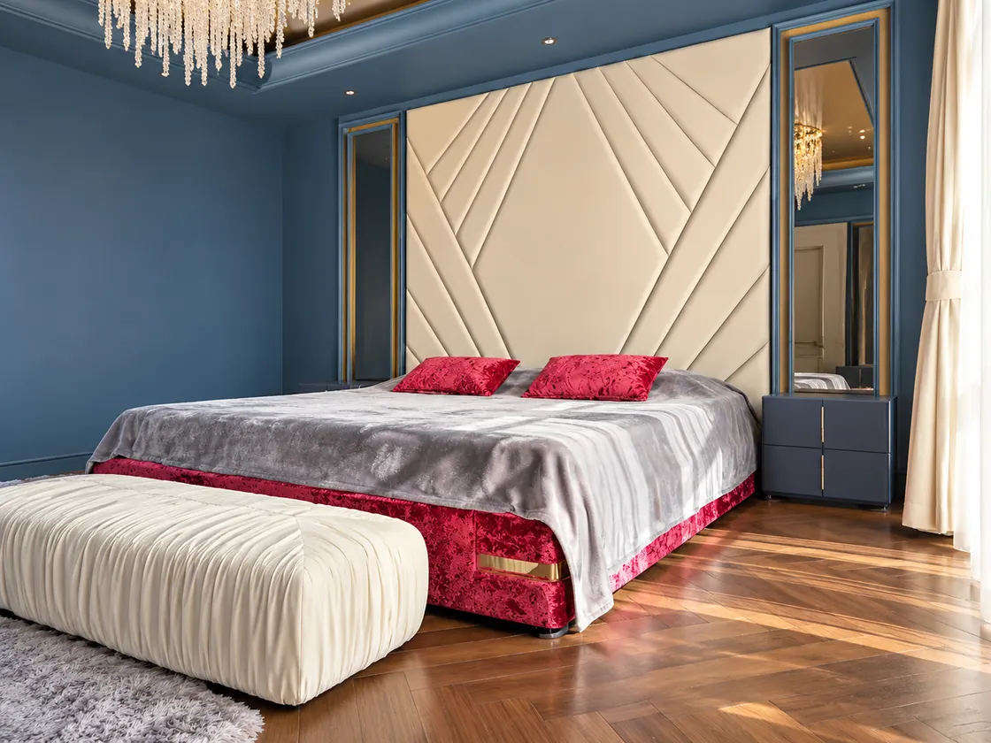 Upholstered bed and cream bench in the blue-toned villa bedroom